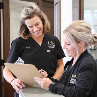 Staff Reviewing Paperwork